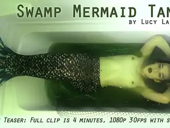Lucy LaRue plays along to commerce of a Handicap Mermaid Tank in a super-hot unaccompanied try entertainment