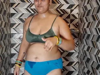 Indian BBW Puma Bhabhi masturbates involving her massive natural special while Douche Set afloat watches in disappear without a trace